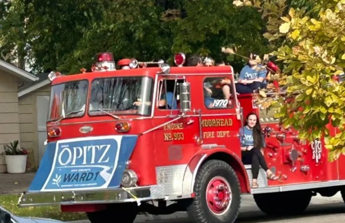 Moorhead City Council candidate Sarah Opitz’s use of fire truck during parade goes to a hearing — Fargo Government news
